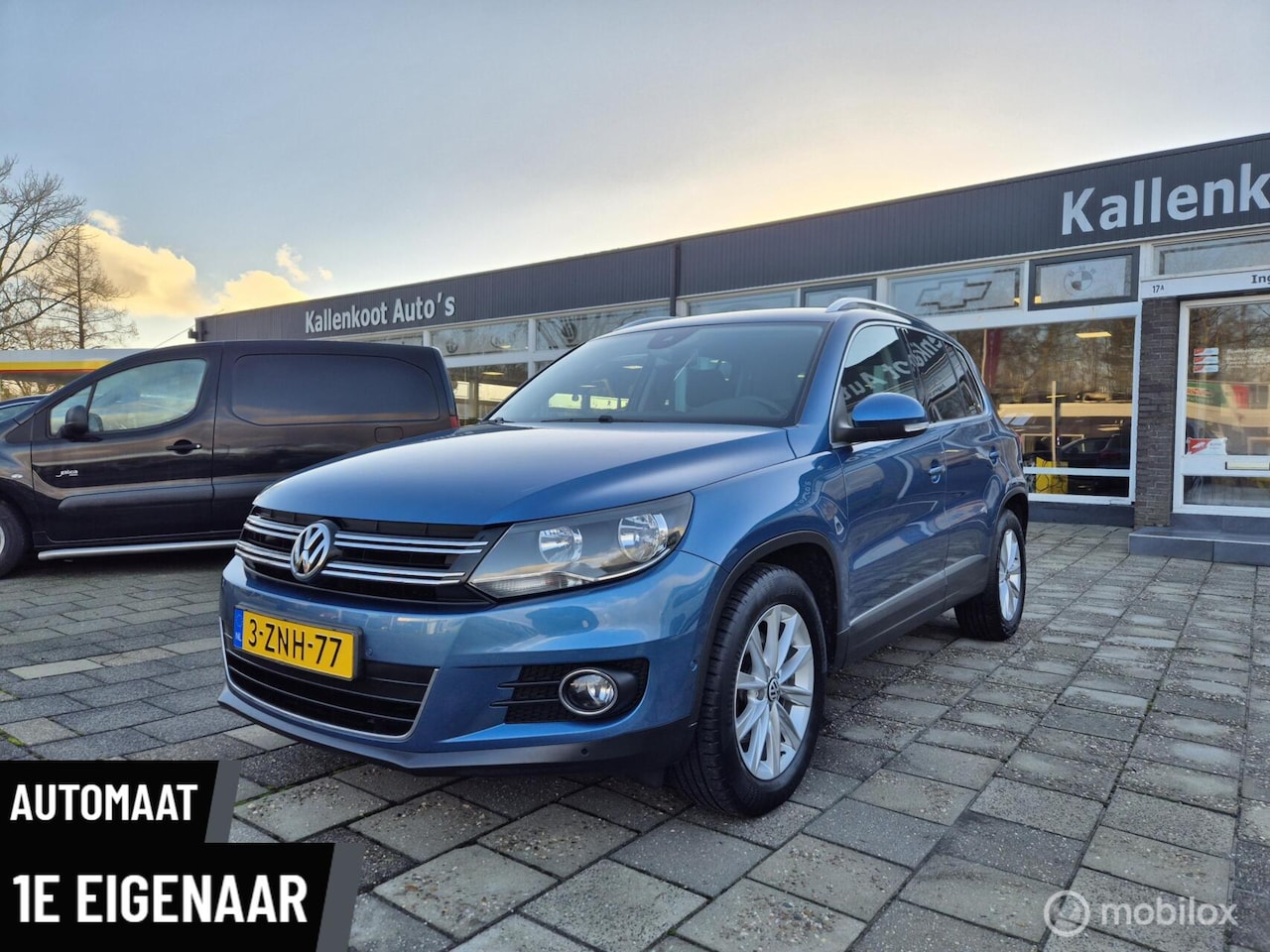 Volkswagen Tiguan - 1.4 TSI Sport&Style, 100% Dealer onderhouden! 1e Eigenaar! - AutoWereld.nl