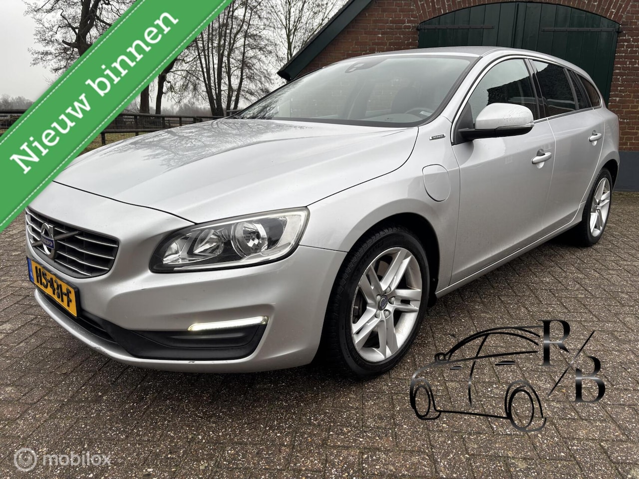 Volvo V60 - 2.4 D6 Twin Engine Momentum AUTOMAAT - AutoWereld.nl