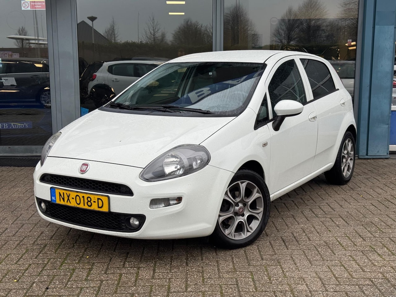 Fiat Punto Evo - 0.9 TwinAir Lounge Airco Navi Lmv Pdc - AutoWereld.nl