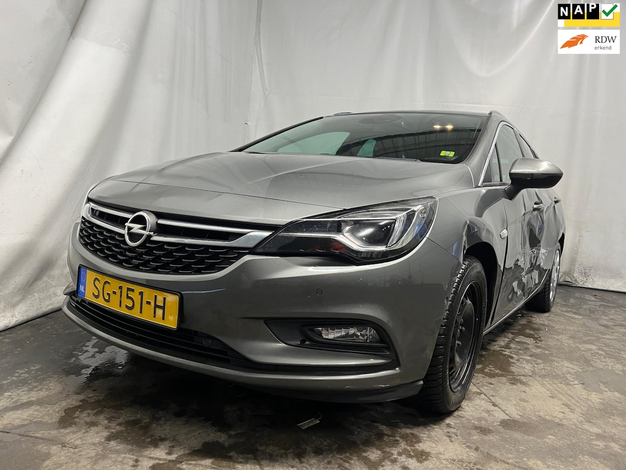 Opel Astra Sports Tourer - 1.4 Innovation - Linker Zijschade - BPM - AutoWereld.nl