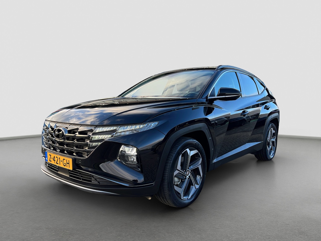 Hyundai Tucson - 1.6 T-GDI 265pk PHEV Premium 4WD | Leder | Carplay | Climate | Trekhaak | Keyless | Naviga - AutoWereld.nl