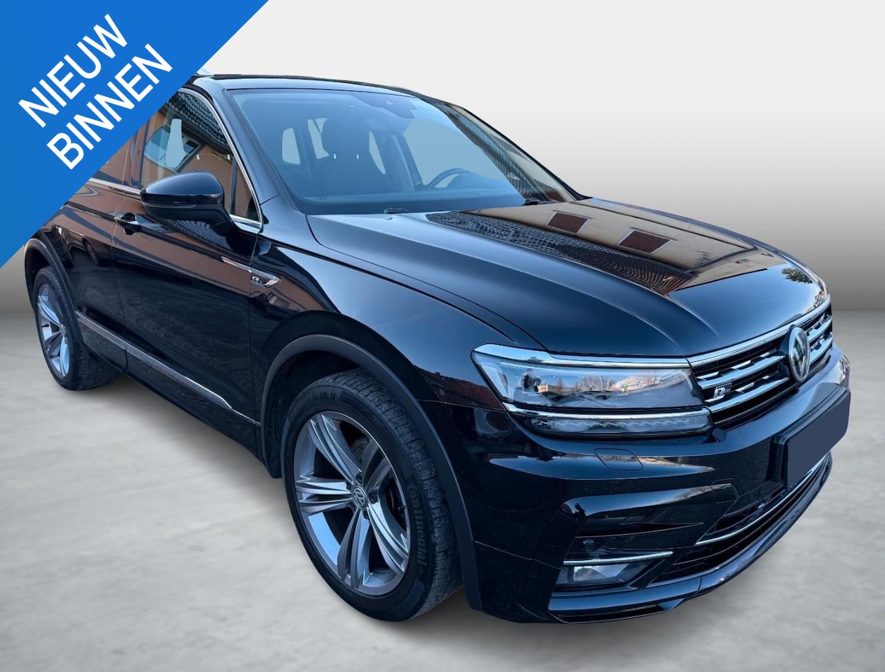 Volkswagen Tiguan - 1.4 TSI R-LINE EXTERIEUR ADAP CRUISE TREKHAAK - AutoWereld.nl