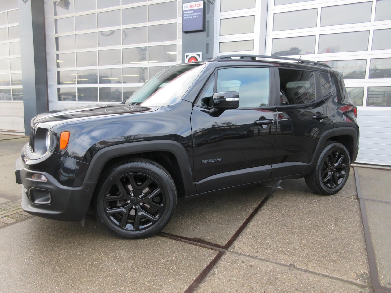 Jeep Renegade - 1.4 MultiAir Limited / Automaat / Navi - AutoWereld.nl