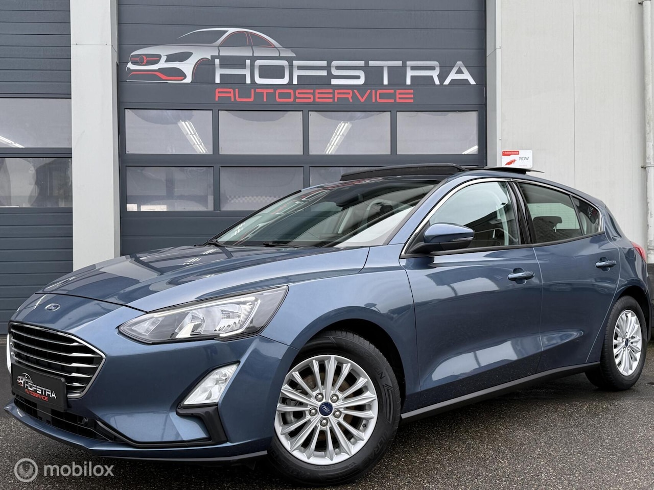 Ford Focus - 1.0 EcoBoost Titanium Panoramadak Carplay Clima - AutoWereld.nl