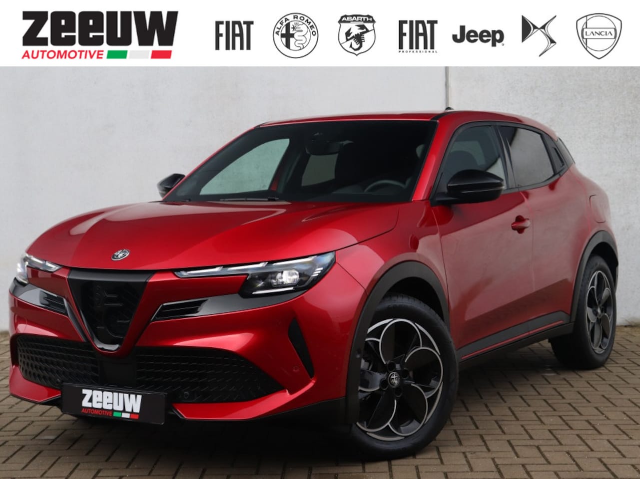 Alfa Romeo Junior - Elettrica Speciale 54 kWh | Techno Pack | "Brera Red" | 18" - AutoWereld.nl