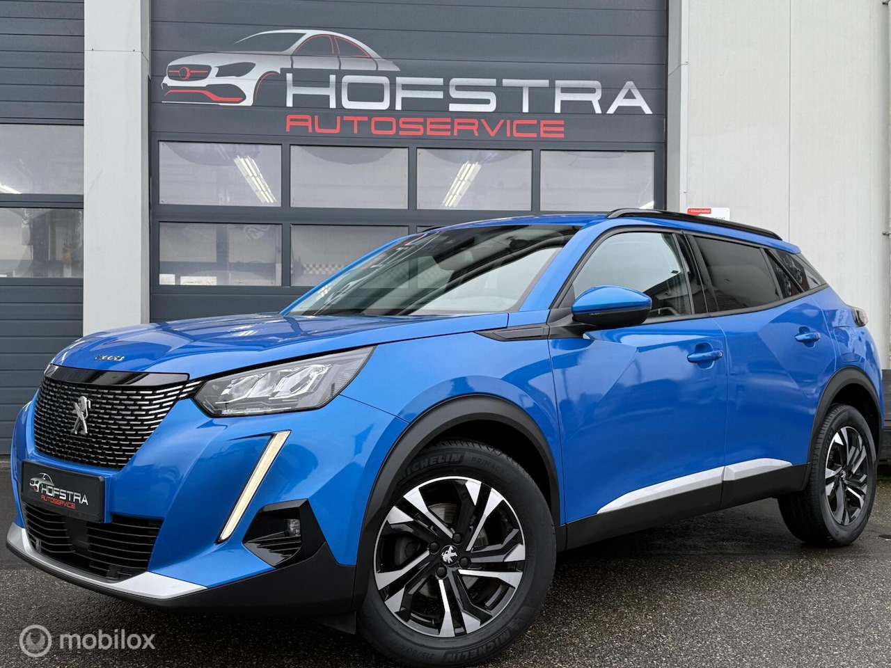 Peugeot 2008 - 1.2 PureTech Allure Camera Carplay Gr-Navi Luxe - AutoWereld.nl