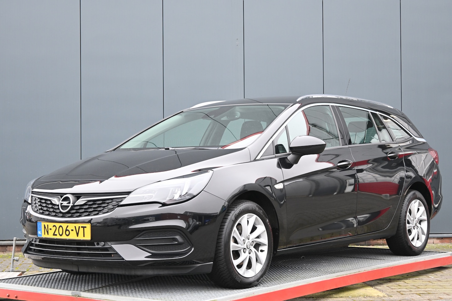 Opel Astra Sports Tourer - 1.4 Business Elegance automaat - AutoWereld.nl