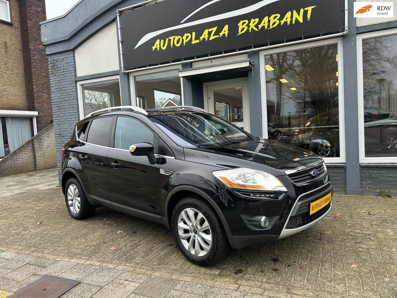 Ford Kuga - 2.5 20V Titanium / AUTOMAAT / PANODAK / LEDER - AutoWereld.nl