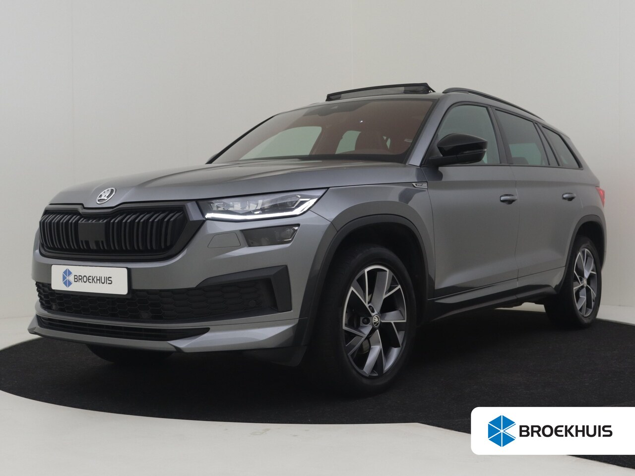 Skoda Kodiaq - 1.5 TSI Sportline Business 7p 150pk DSG/AUTO | Panoramadak Elektrisch | Trekhaak uitklapba - AutoWereld.nl