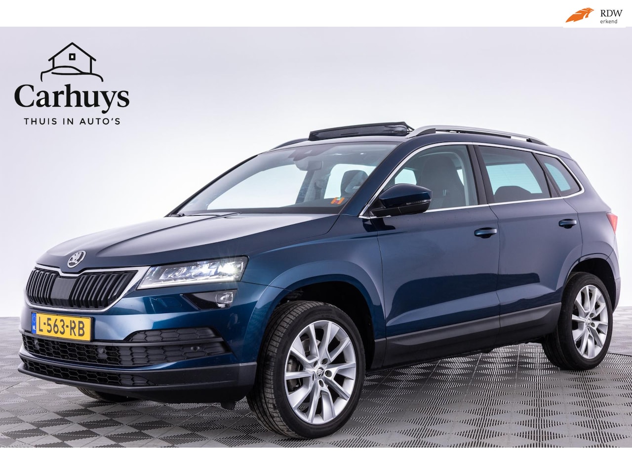 Skoda Karoq - 1.5 TSI ACT Style Business/Panodak/Adap.cruise/A.Camera/Stoelverw v/a/Apple Carplay/Sports - AutoWereld.nl