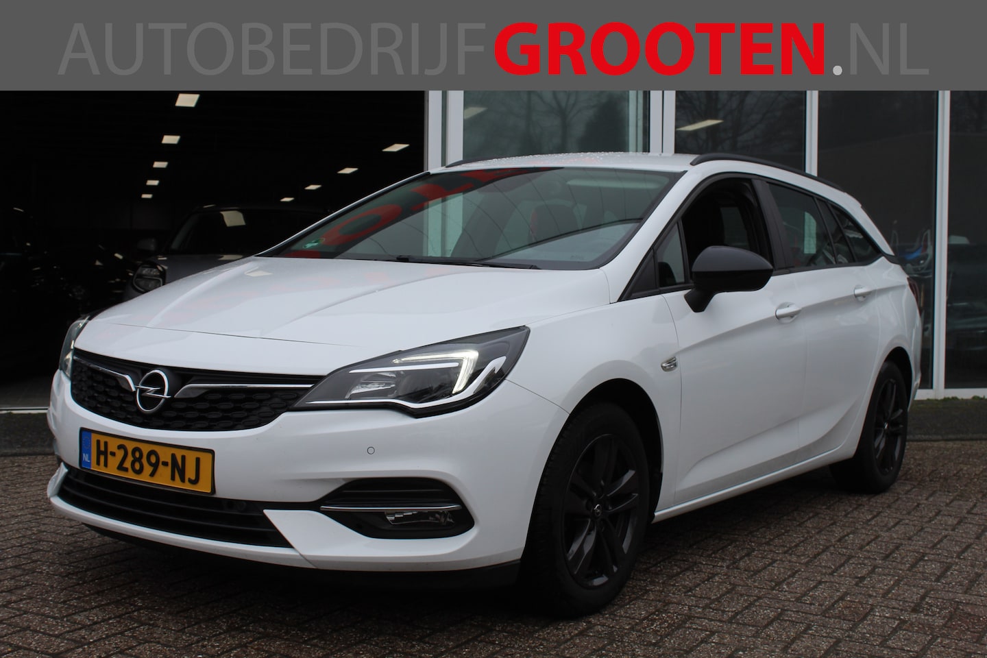 Opel Astra Sports Tourer - 1.2 Edition//ECC//Camera//Trekhaak!! - AutoWereld.nl