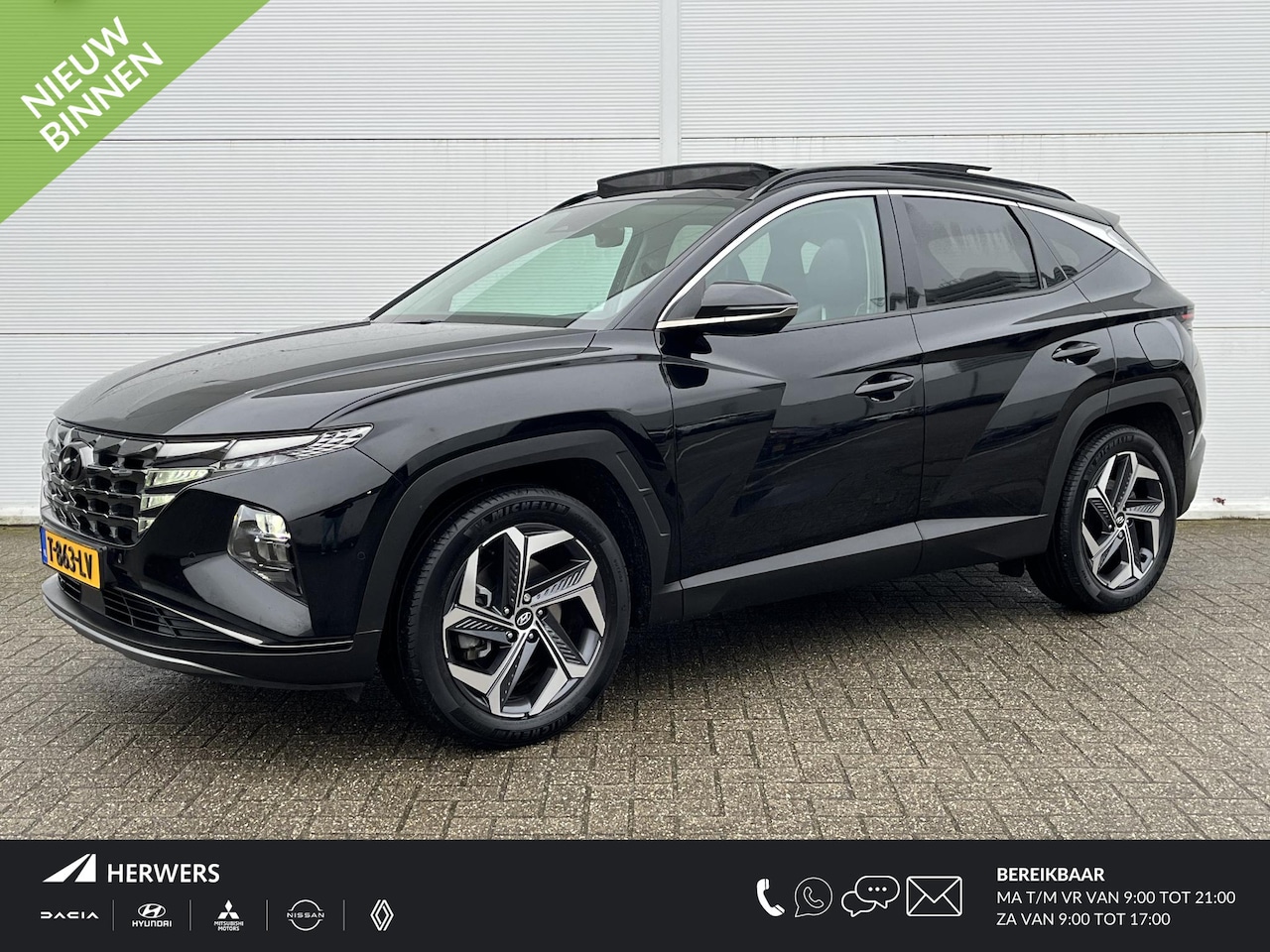 Hyundai Tucson - 1.6 T-GDI HEV Premium Sky / Apple Carplay/Android Auto / Airco (automatisch) / Cruise cont - AutoWereld.nl