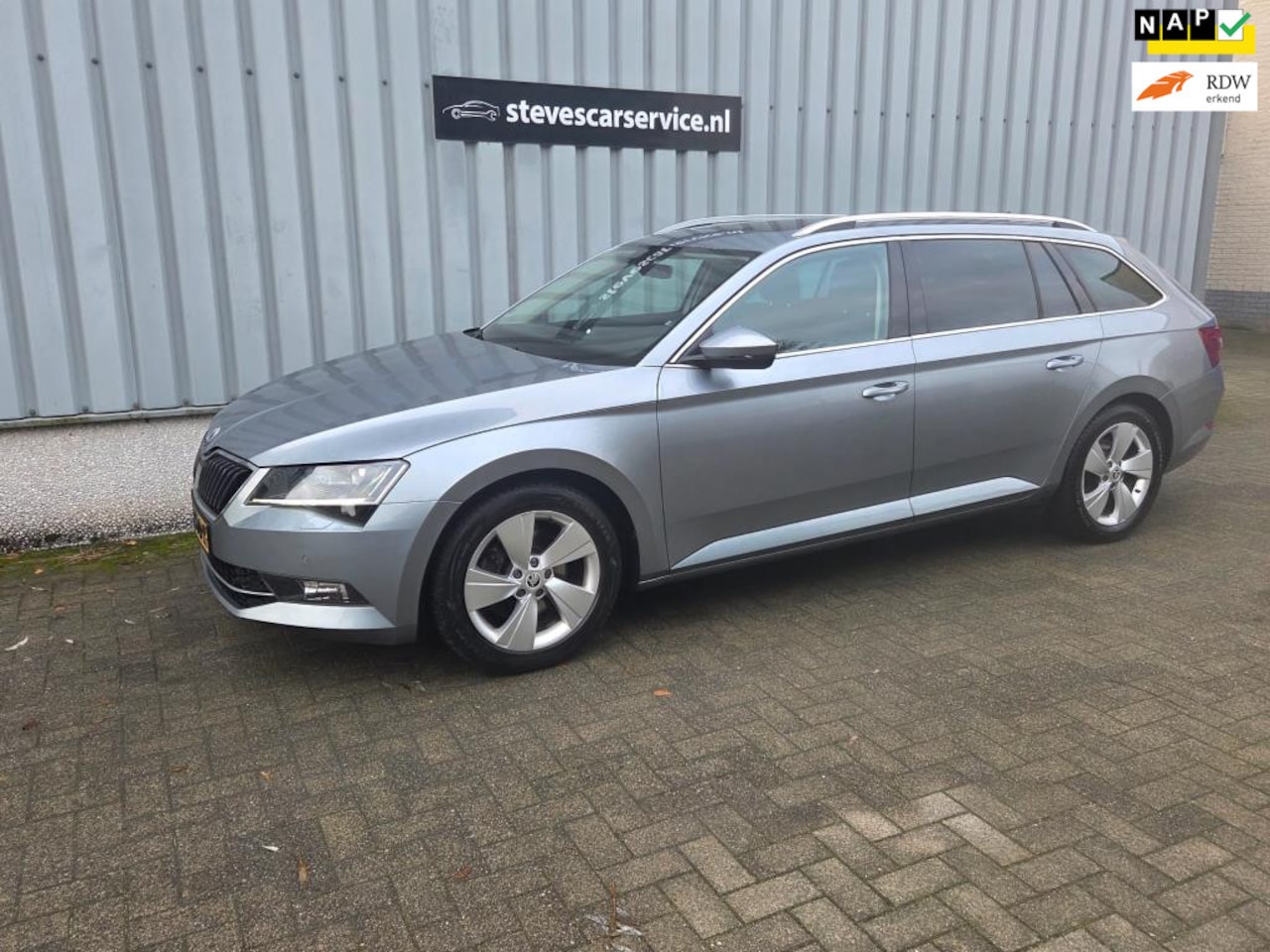 Skoda Superb Combi - 1.4 TSI Ambition Business bomvolle auto leer panoramadak etc - AutoWereld.nl