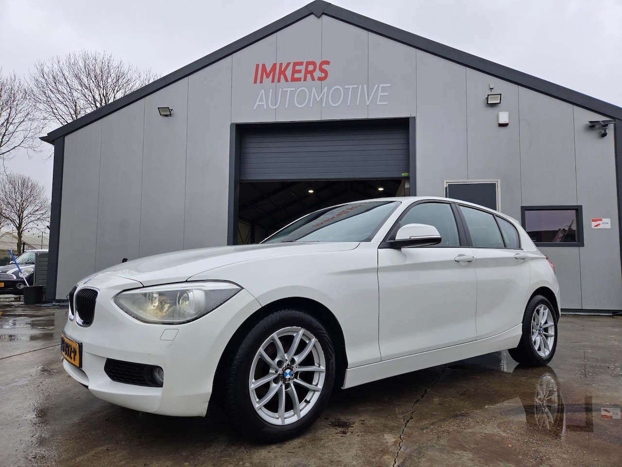 BMW 1-serie - 116d High Executive | Dak | Stoelverw. | PDC | Navi - AutoWereld.nl