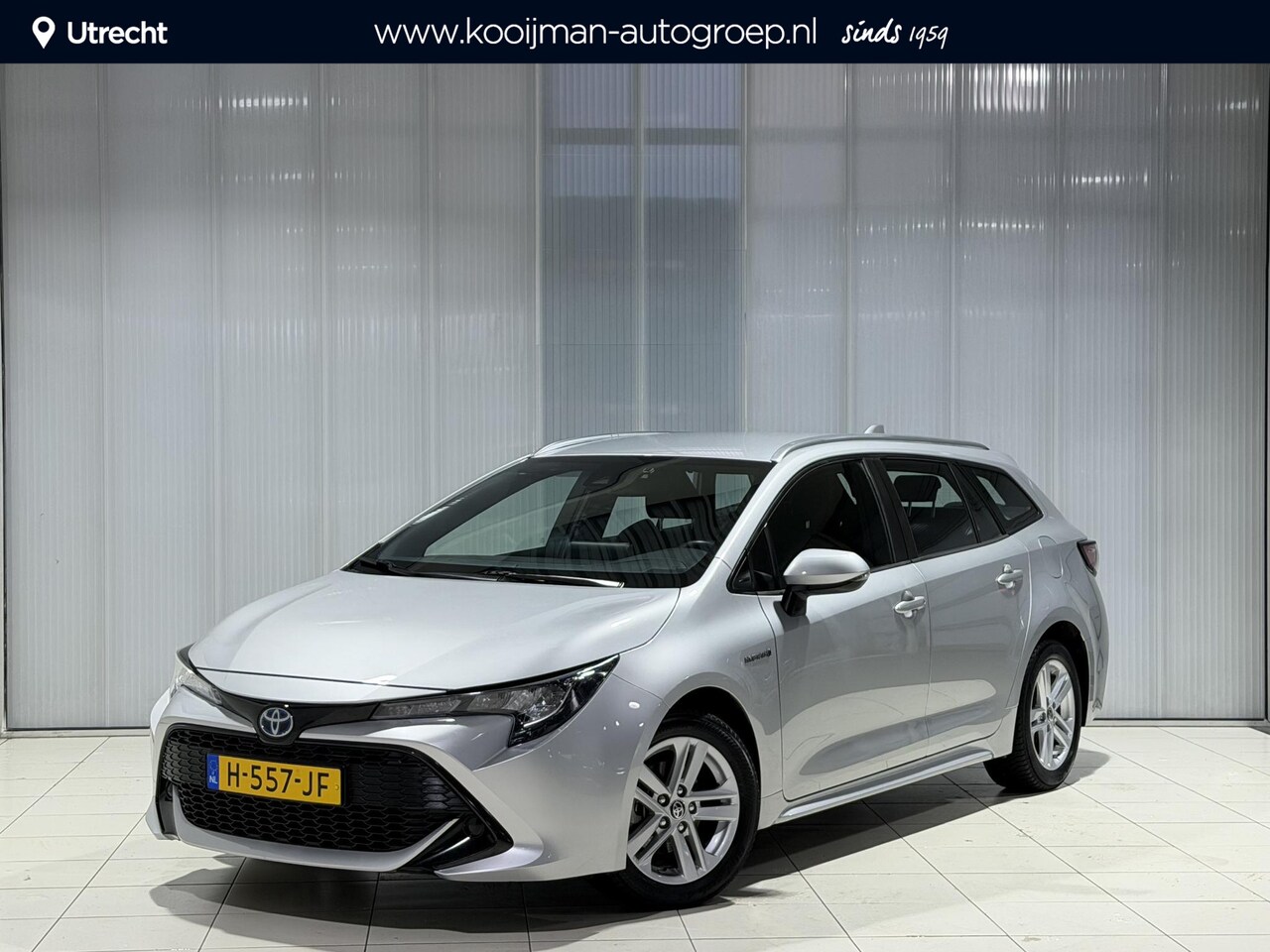Toyota Corolla Touring Sports - 1.8 Hybrid Active | Navigatie | Dealer onderhouden | - AutoWereld.nl