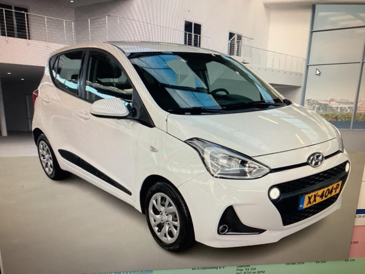 Hyundai i10 - 1.0i Comfort airco navigatie - AutoWereld.nl
