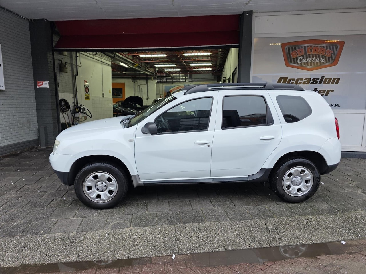 Dacia Duster - 1.6 Lauréate 2wd 1.6 Lauréate 2wd - AutoWereld.nl