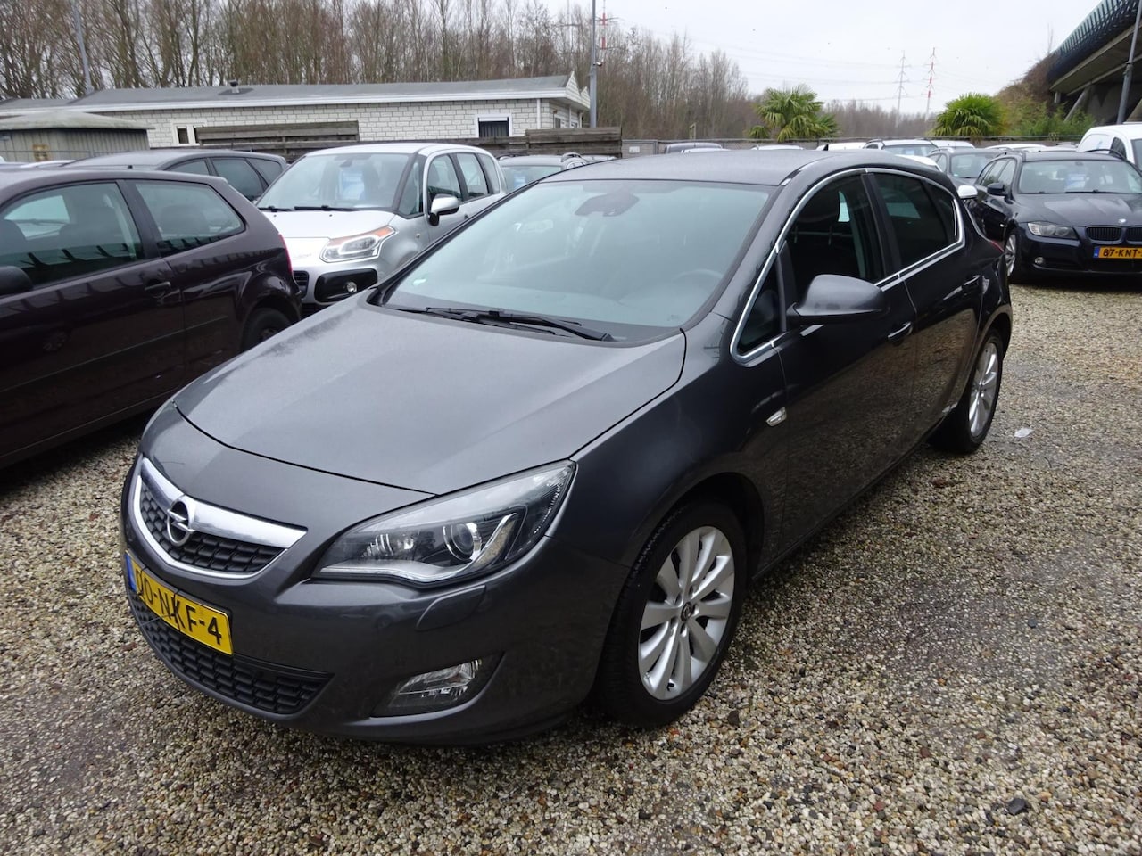 Opel Astra - 1.4 Cosmo airco navigatie trekhaak - AutoWereld.nl