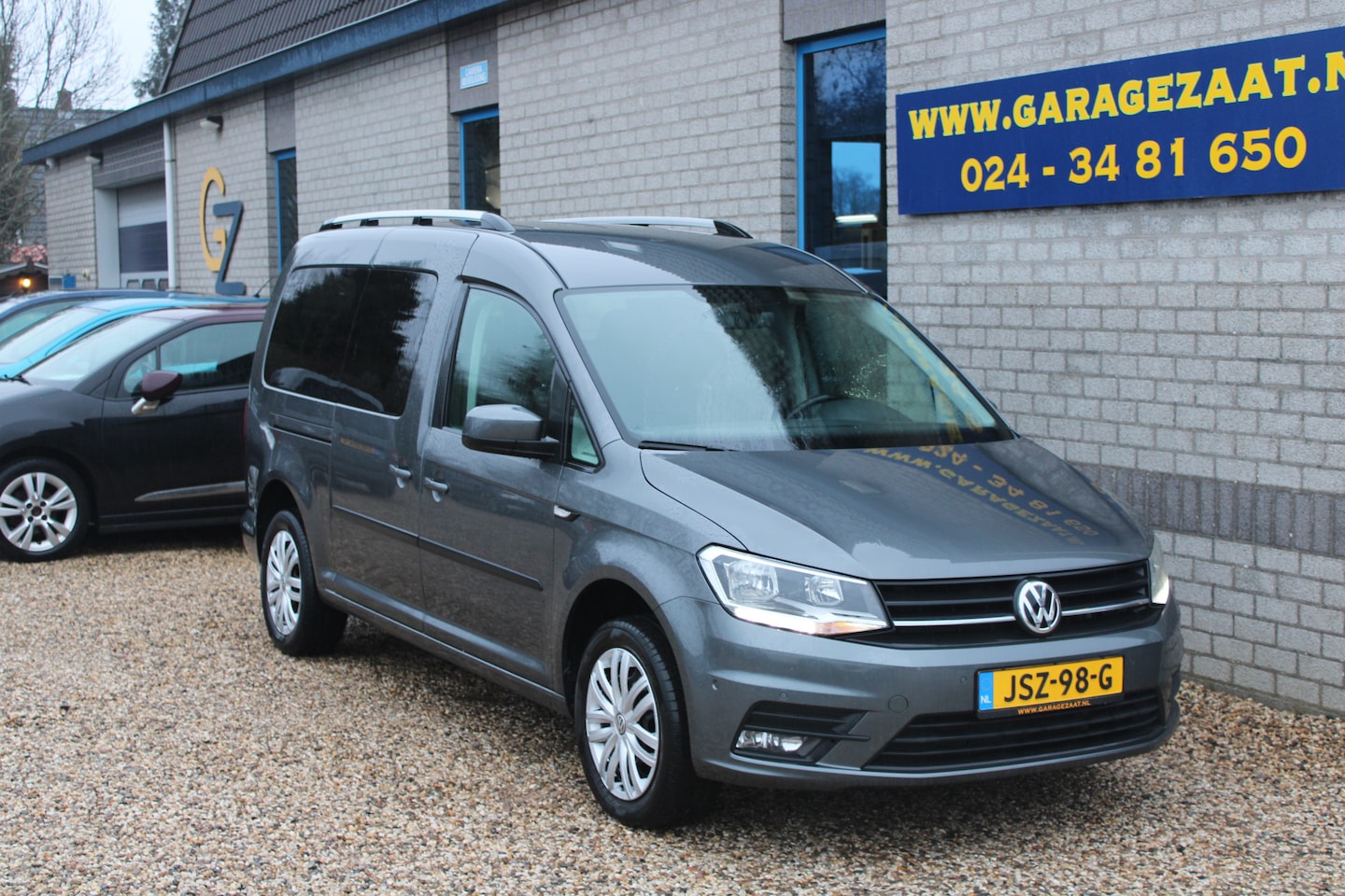 Volkswagen Caddy Maxi - 1.4 TSI Trendline 5p tussenwand navi pdc trekhaak camera - AutoWereld.nl