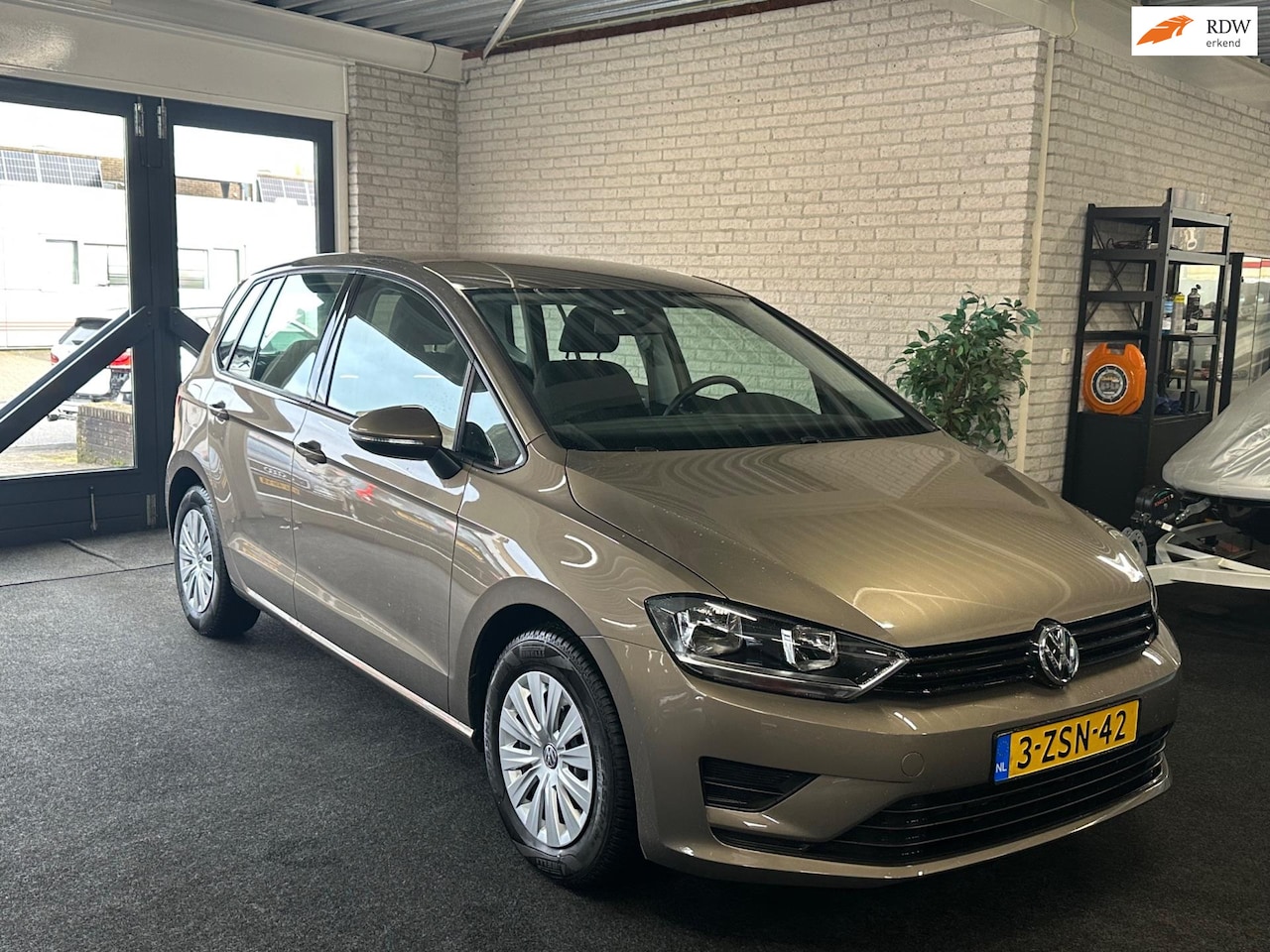 Volkswagen Golf Sportsvan - 1.2 TSI Trendline Automaat 73.611km - AutoWereld.nl