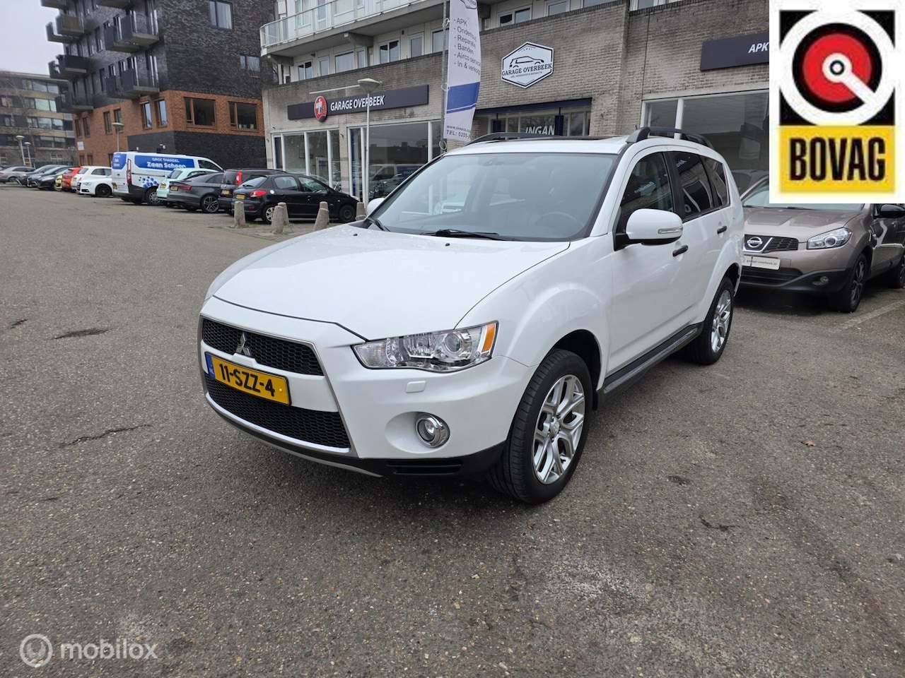 Mitsubishi Outlander - 2.4 2012 AUT/7PERS/LEDER/TRKHAAK/DAKJE! - AutoWereld.nl