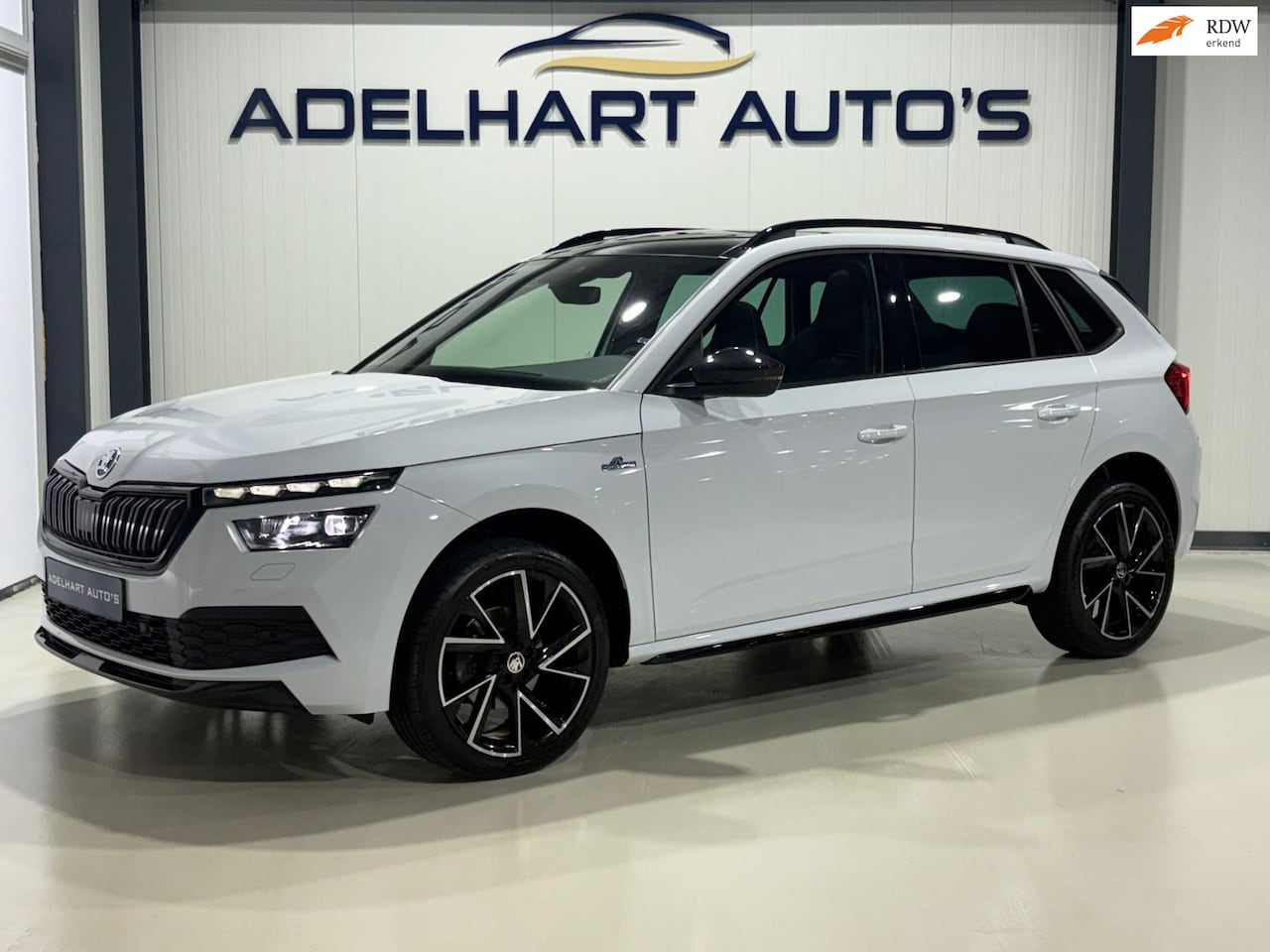 Skoda Kamiq - 1.5 TSI ACT Monte Carlo Automaat / Panorama dak / Navigatie full map / Camera / Cruise con - AutoWereld.nl