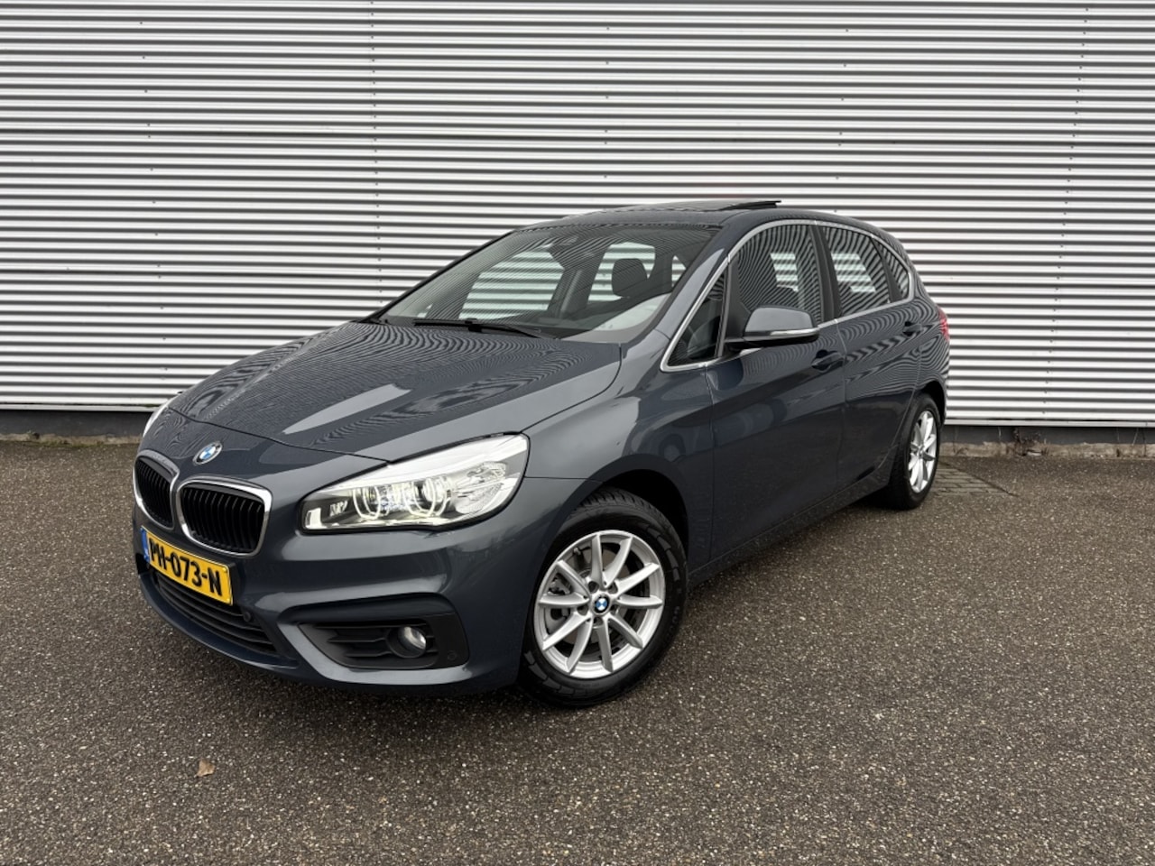 BMW 2-serie Active Tourer - 218i Corp.L.Exec NAP Dealer OH Pano Harman Kardon Leer Memory - AutoWereld.nl
