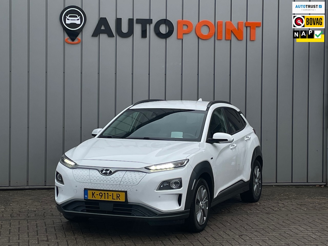 Hyundai Kona Electric - EV Premium 64 kWh SOH100% TREKHAAK|STOEL.VRM+VERKOELING|LEDER|NAVI|LED|STUURVERWARMING|LAN - AutoWereld.nl