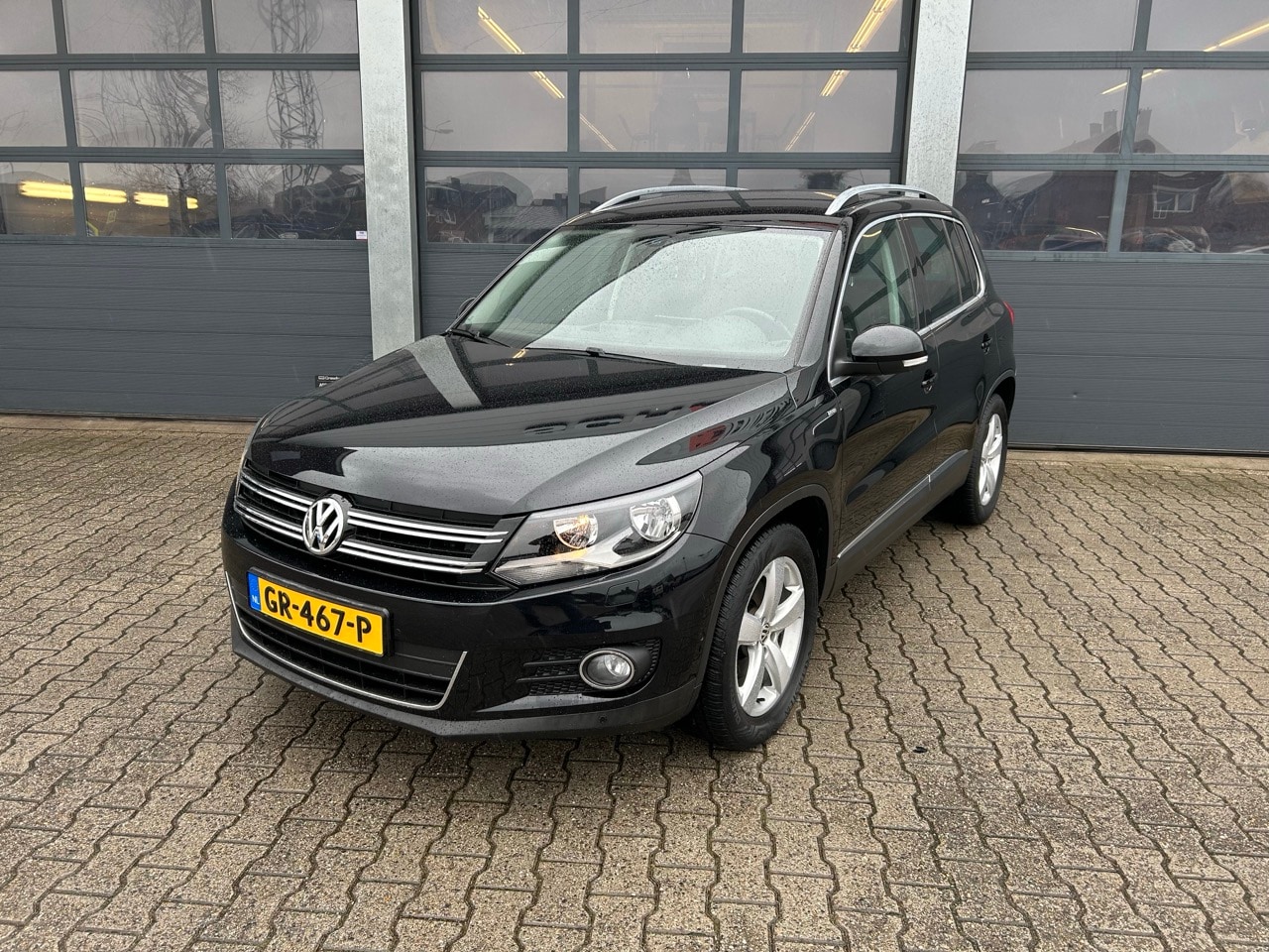Volkswagen Tiguan - 1.4 TSI 122pk Sport & Style - AutoWereld.nl