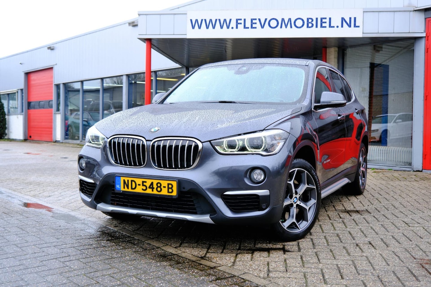 BMW X1 - SDrive20d Centennial High Executive Aut. Navi|Leder|HUD|Sportstoelen|LMV - AutoWereld.nl