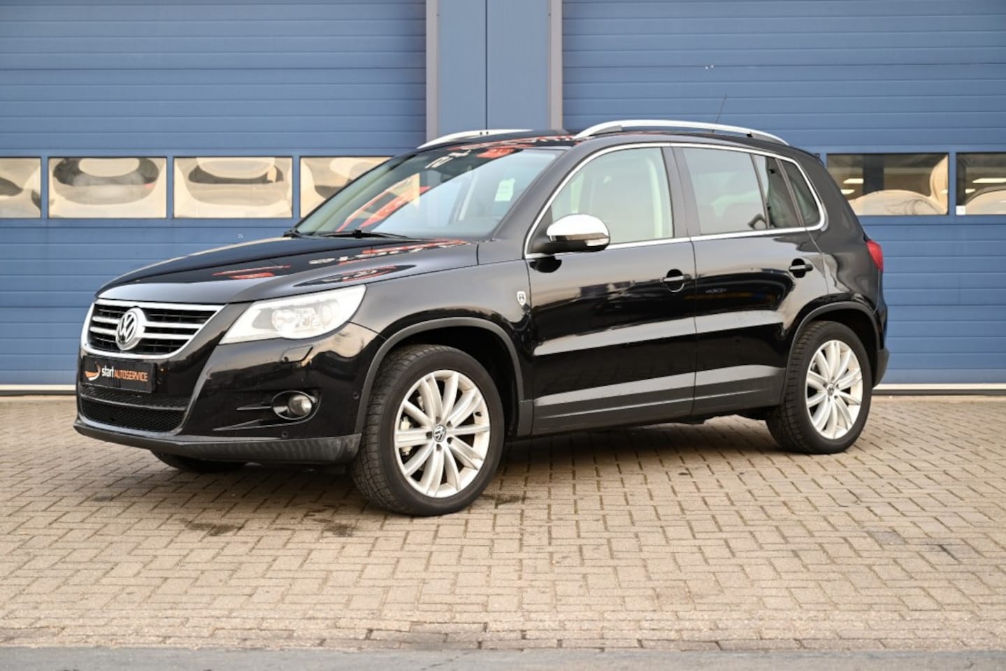 Volkswagen Tiguan - 2.0 4Motion DSG Pano - AutoWereld.nl