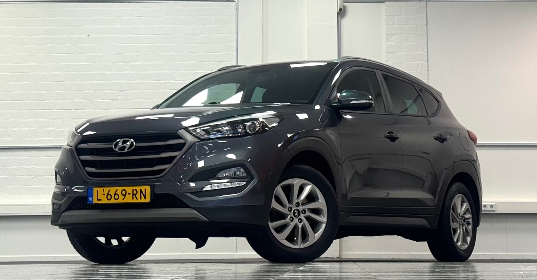 Hyundai Tucson - 1.6 GDi i-Motion Trekhaak Navigatie Camera APK13-01-2027 - AutoWereld.nl