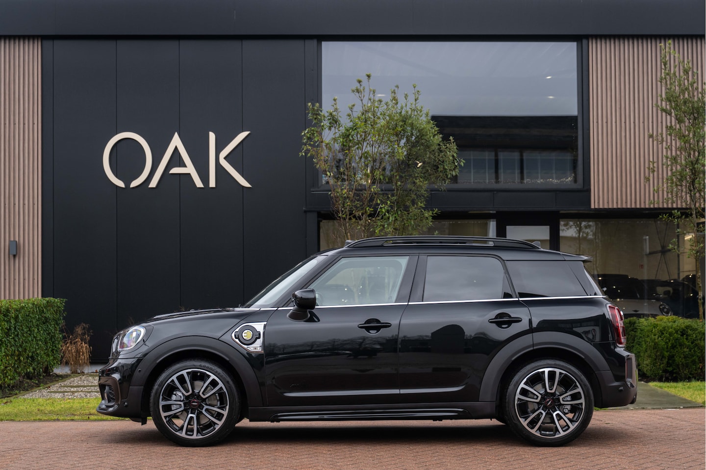 MINI Countryman - 1.5 Cooper SE Hybride ALL4 JCW-Trim | Navi | Panorama | Leder | Memory | H&K | Head-Up | 1 - AutoWereld.nl