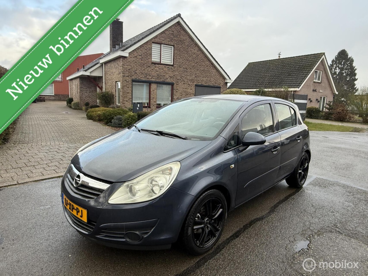Opel Corsa - 1.2-16V Sport 1.2-16V Sport - AutoWereld.nl