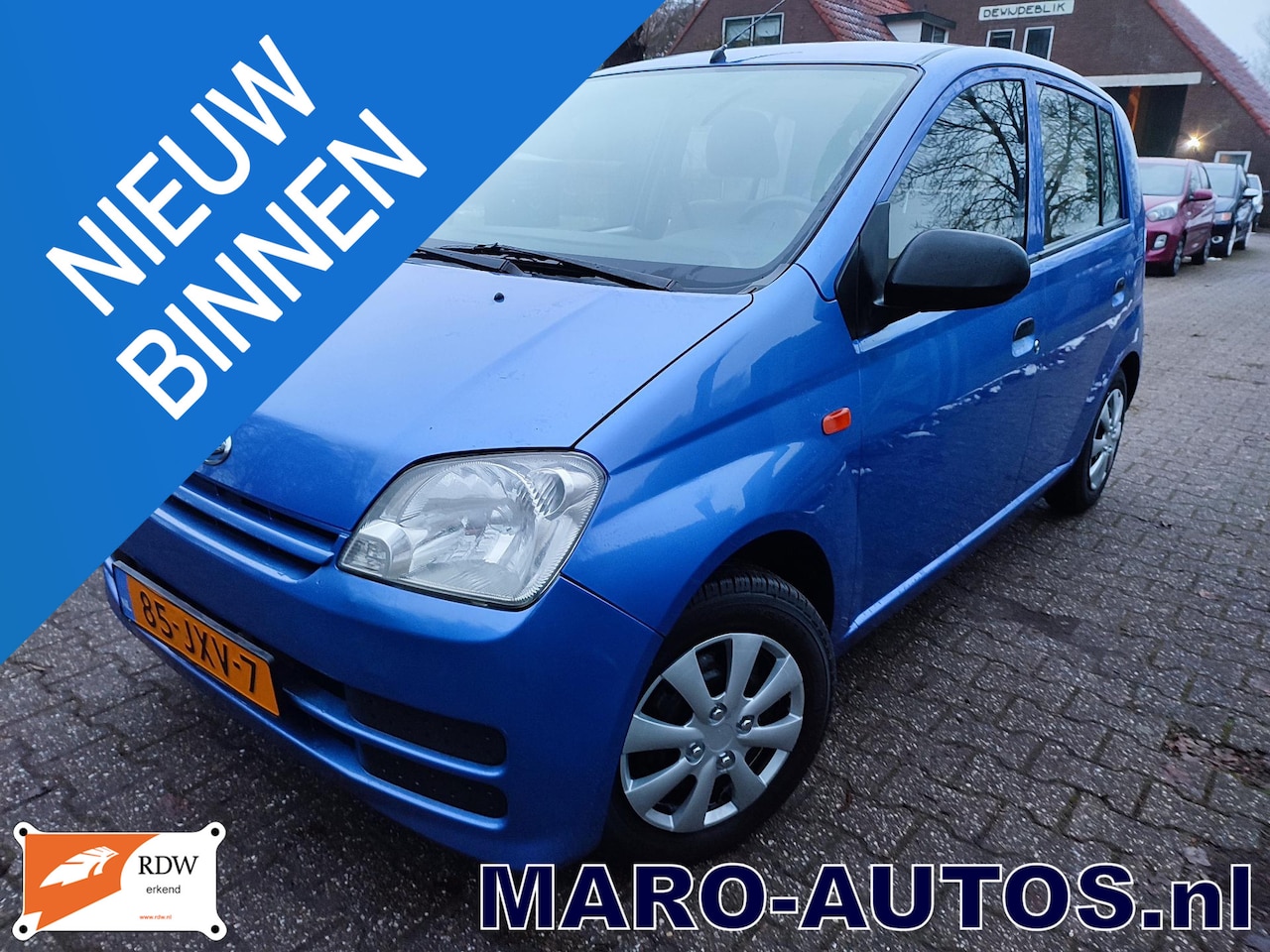 Daihatsu Cuore - 1.0-12V 5d. Anniversary | NW. DISTR.+KOPPELING! 5-DEURS! Boekjes! 2009| RIJKLAAR! - AutoWereld.nl