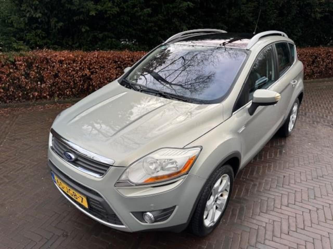 Ford Kuga - 2.5 20V TITANIUM AWD 200PK TREKHAAK PANO/LEER/ACARPLAY/NAV/CAM - AutoWereld.nl