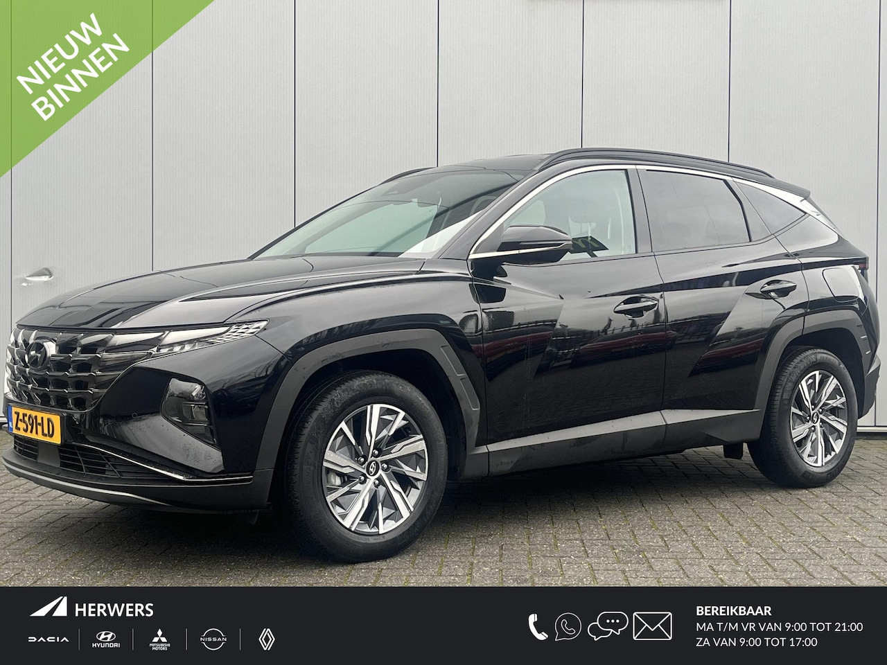 Hyundai Tucson - 1.6 T-GDI HEV Comfort Smart / Elektrische Achterklep / Navigatie / Stoel & Stuurverwarming - AutoWereld.nl