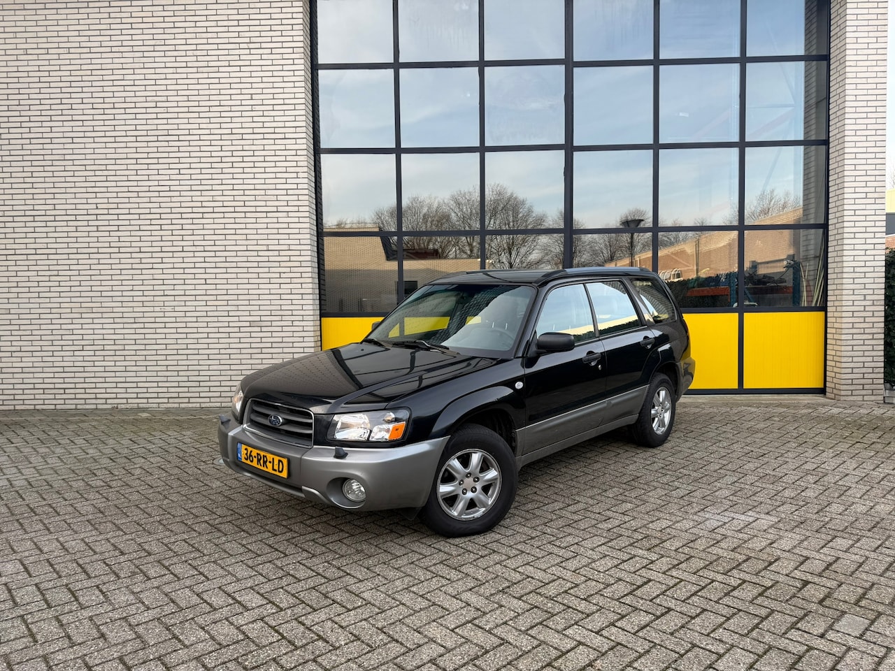 Subaru Forester - 2.0 AWD X 2.0 AWD X, trekhaak, airco & stoelverwarming - AutoWereld.nl