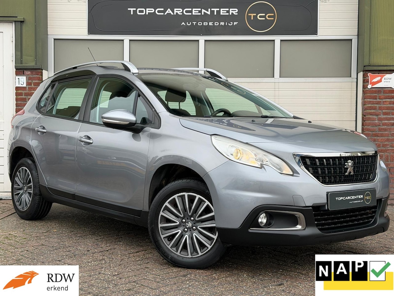 Peugeot 2008 - 1.2 Active/AIRCO/NAVI/PARKS/CRUISE/APK/NAP - AutoWereld.nl