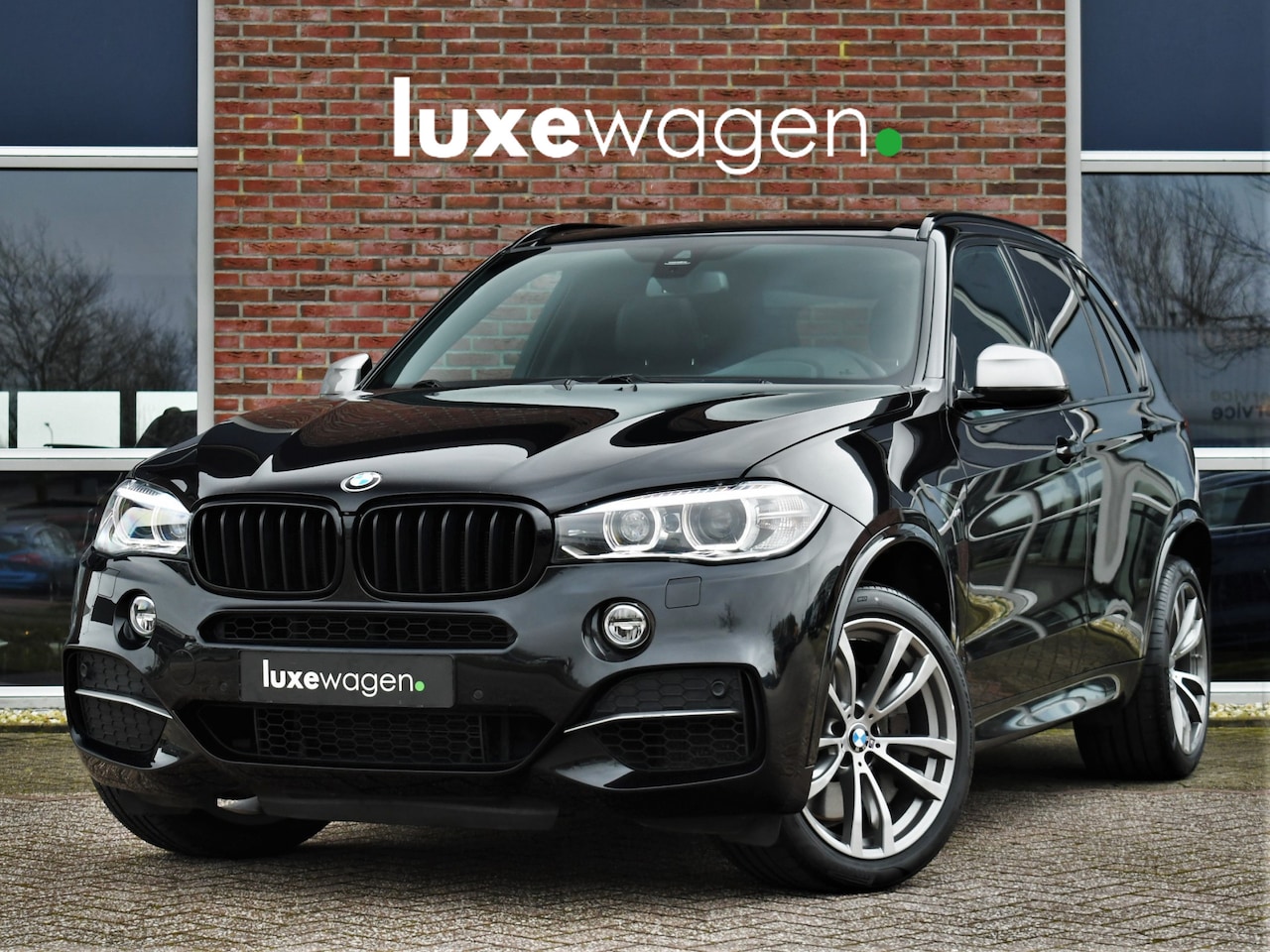 BMW X5 - M50d 381pk grijs kenteken Pano HUD H/K Trekh 20inch - AutoWereld.nl