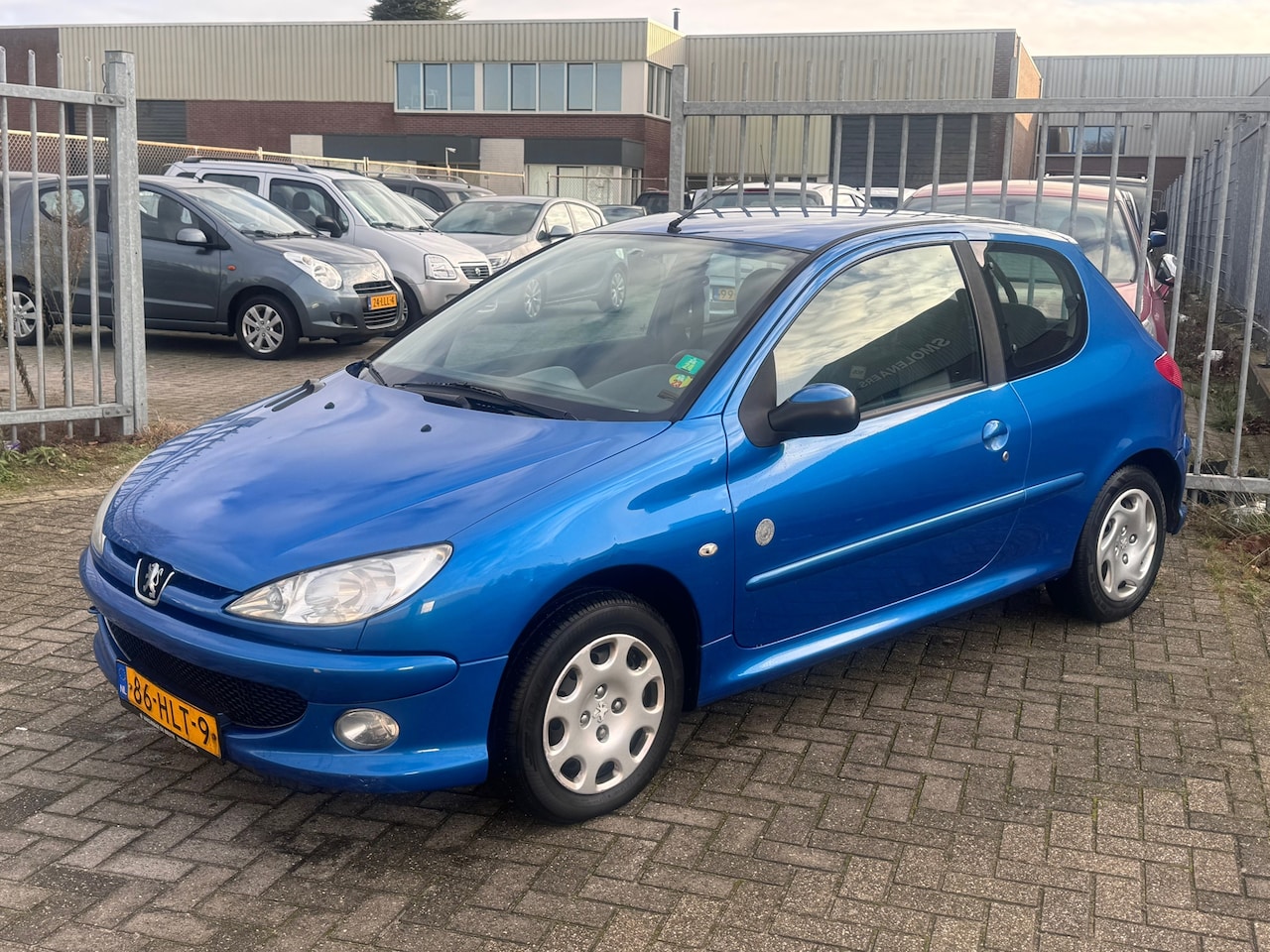 Peugeot 206 - 1.4 Génération Airco l Cruise l Elek pakket l Centraal! KOOPJE!! - AutoWereld.nl