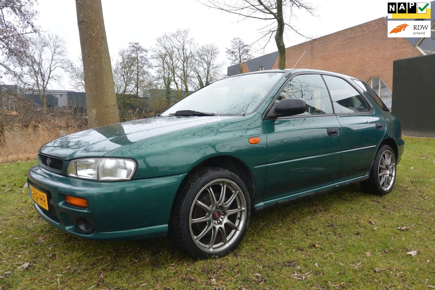 Subaru Impreza Plus - Station wagon 1.6 GL AWD - AutoWereld.nl