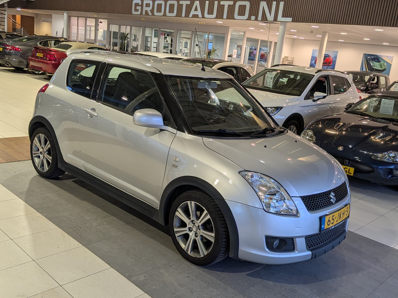 Suzuki Swift - 1.3 Bandit Airco, Stuurbekrachtiging - AutoWereld.nl