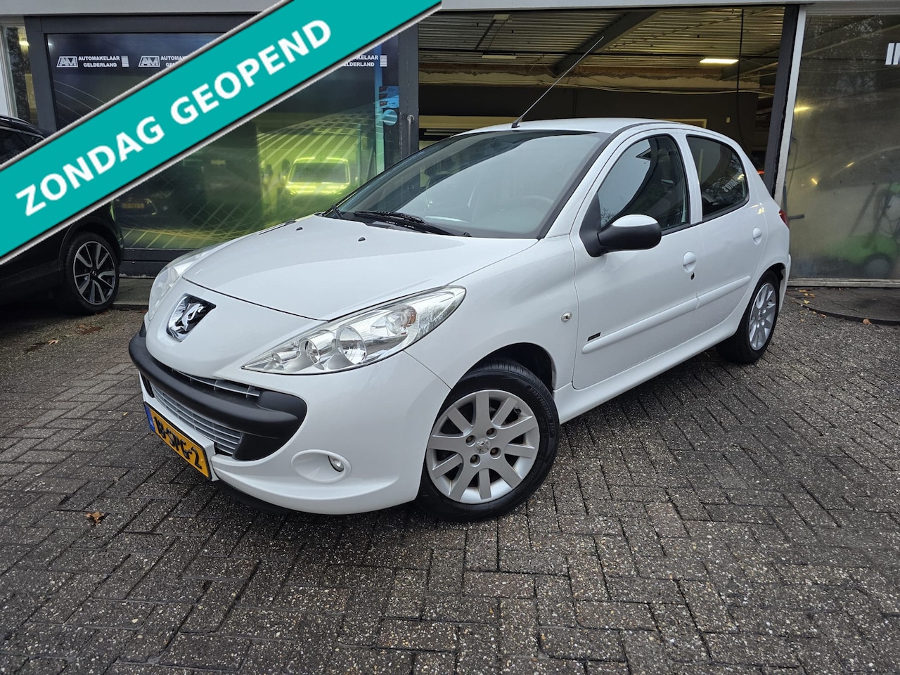 Peugeot 206 - 1.4 Sportium | 2E EIGENAAR |12MND GARANTIE | AIRCO | ELEC RAMEN | LMV - AutoWereld.nl
