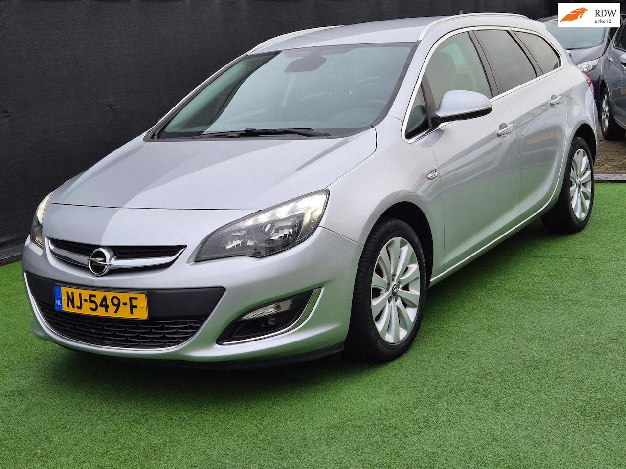 Opel Astra Sports Tourer - 1.4 Edition NAVI LMV! - AutoWereld.nl