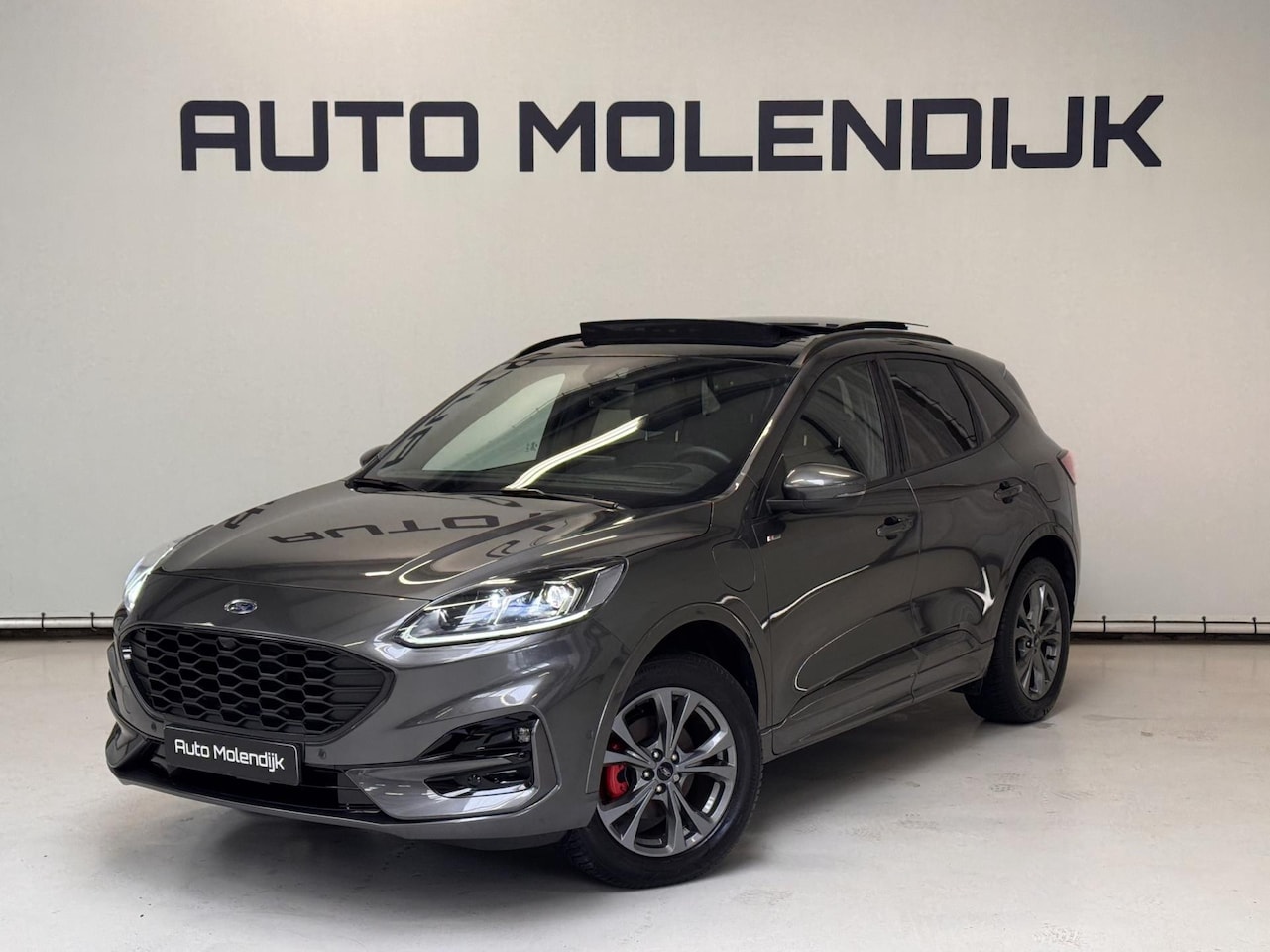 Ford Kuga - 2.5 PHEV ST-Line / Panorama / Trekhaak / Keyless / el. klep - AutoWereld.nl