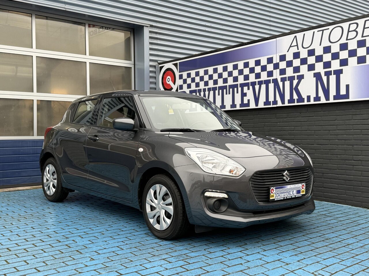 Suzuki Swift - 1.2 5DRS AIRCO LAGE KM DEALER ONDERH. - AutoWereld.nl