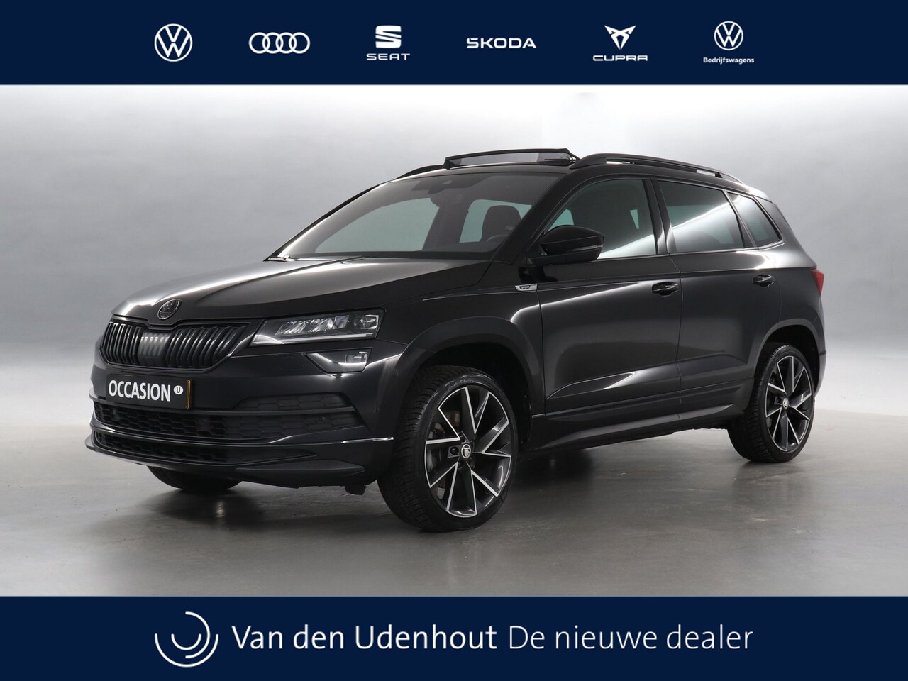 Skoda Karoq - 1.5 TSI 150pk ACT Sportline Business DSG / Panoramadak / Navigatie / Stoelverwarming / Cam - AutoWereld.nl