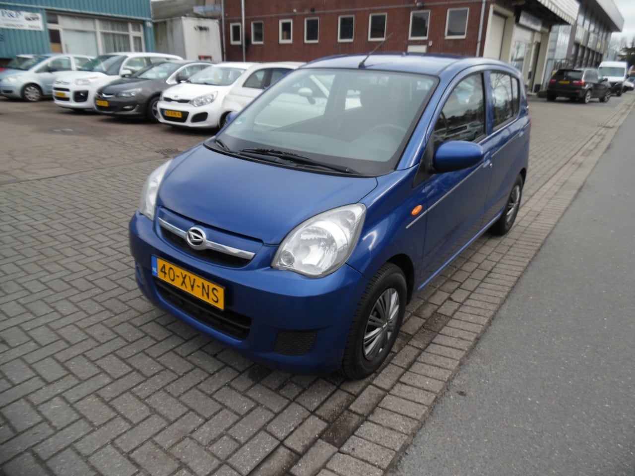 Daihatsu Cuore - st bekr NAP 1.0 Premium apk 9.26 - AutoWereld.nl