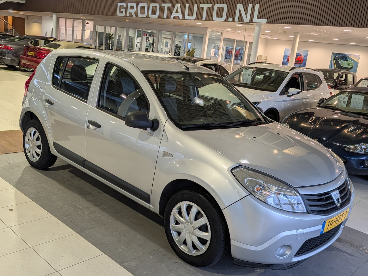 Dacia Sandero - 1.4 Ambiance Airco, Stuurbekrachtiging - AutoWereld.nl